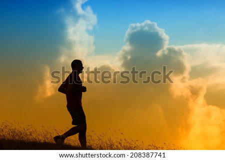 silhouette of a jogger in beautiful sunrise