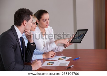 Group of happy business people in a meeting at modern office