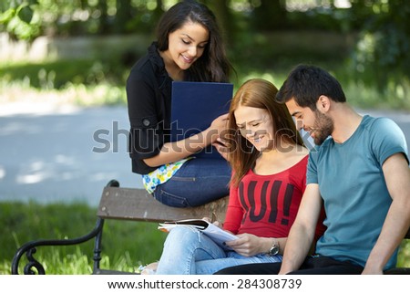Friends and education, group of university students studying, reviewing homework and preparing test
