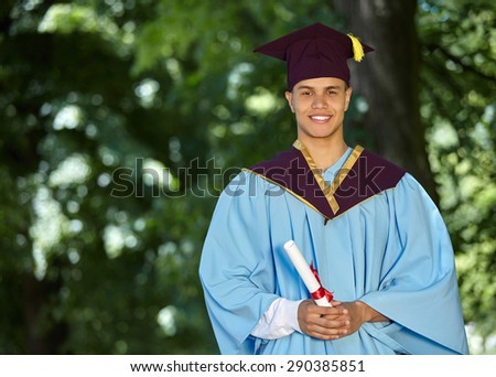 Young Graduation Man Holding Certificate, Outdoor