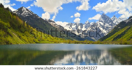This is lake in Caucasus mountains in spring