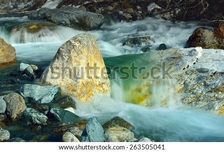 This is green river in Caucasus mountains in spring