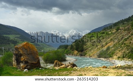 This is somber valley in Caucasus mountains in spring