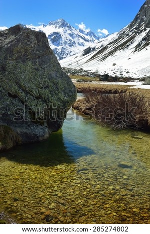 This is transparent water in Caucasus mountains in spring