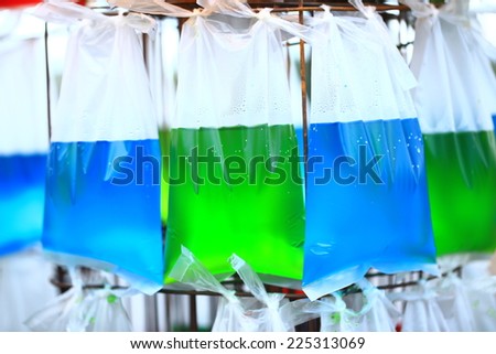 colorful water in plastic bag, used for background