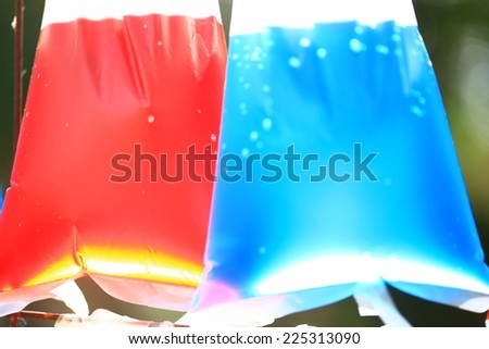 colorful water in plastic bag, used for background