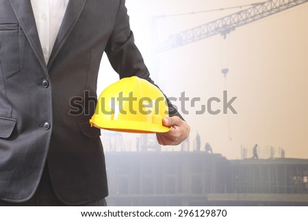 Construction engineers oversee construction background
