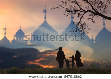 Muslim Family silhouettes supplications, prayers East peace background blur mosque,Concept of Islam is the religion