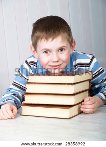 The child with books on the table