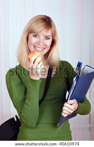 Portrait of a young attractive student on the white background