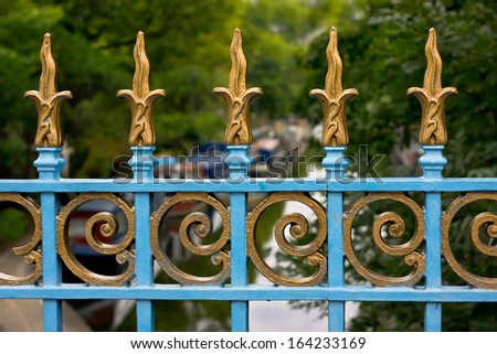 Colorful steel fence on blue bridge of Little Venice in London