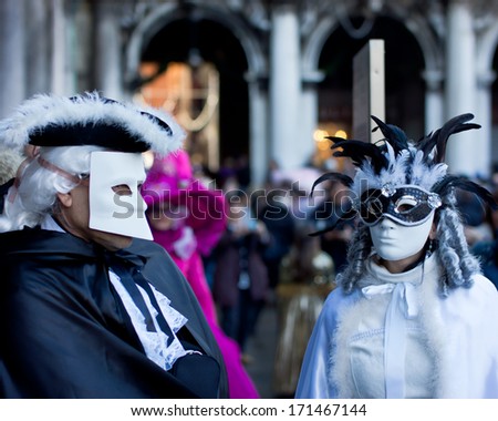 VENICE, ITALY - FEBRUARY 03, 2013 : Unidentified persons with Venetian Carnival mask in Venice, Italy on February 03, 2013. In 2013 the Venetian Carnival was held between 01 and 12 of February.