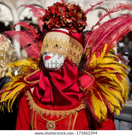 VENICE, ITALY - FEBRUARY 04, 2013 : Unidentified woman with Venetian Carnival mask in Venice, Italy on February 04, 2013.  In 2013 the Carnival was held between 01 and 12 of February.
