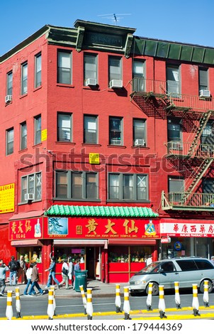 NEW YORK,  UNITED STATES OF AMERICA - OCTOBER 17, 2015 : Colorful brick building in China Town of New York on October 17, 2011. China Town is very attractive place to visit  in New York.
