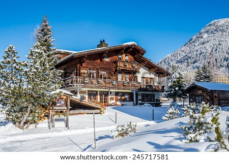 Wood chalet in winter resort Davos, Switzerland.