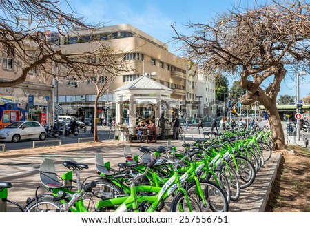 TEL AVIV, ISRAEL - FEBRUARY 26, 2015 : City green bicycles  at boulevard Rothschild in Tel Aviv, Israel. City bicycles  are very popular for  travel  in Tel Aviv.