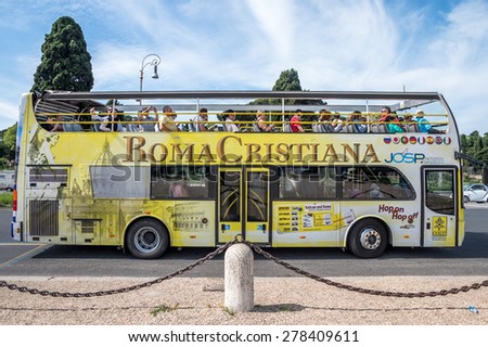 ROME, ITALY - MAY 03, 2015 : Yellow city sightseeing  bus at Rome, Italy.