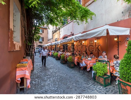 ROME, ITALY - MAY O5, 2015 : Unknown people  outside restaurant in Rome, Italy.