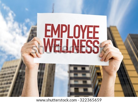 Employee Benefits placard with cityscape background