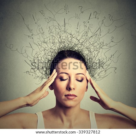 Closeup young woman with worried stressed face expression eyes closed trying to concentrate with brain melting into lines question marks deep thinking. Obsessive compulsive, adhd, anxiety disorders