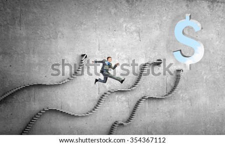 Businessman running on ladder leading to financial success
