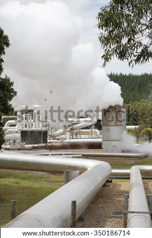 GEOTHERMAL POWER PRODUCTION PLANT NORTH ISLAND NEW ZEALAND = CIRCA 2014 - Steam and pipework at the Wairakei Geothermal Power Station at Taupo New Zealand