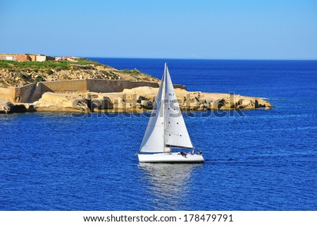 VALLETTA, MALTA - FEBRUARY 16: Sail boat in harbor of Maltese islands in Mediterranean sea on February 16, 2014. Malta is a southern European country in the Mediterranean Sea.