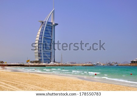 Dubai, Uae - June 11: Burj Al Arab, The Most Expensive Hotel In The World In Dubai City On June 11, 2012. Dubai Is A City In The United Arab Emirates, Located Within The Emirate Of The Same Name