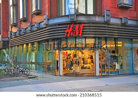 POZNAN, POLAND - AUGUST 2: Facade of H&M flagship store in Poznan downtown on August 2, 2014. H&M is a Swedish multinational clothing company, known for its fast-fashion clothing.