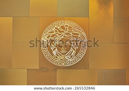 HO CHI MINH, VIETNAM - MARCH 7: Logo of Versace flagship store in Ho Chi Minh city centre on March 7, 2015. Versace is a world famous fashion brand founded in Italy.