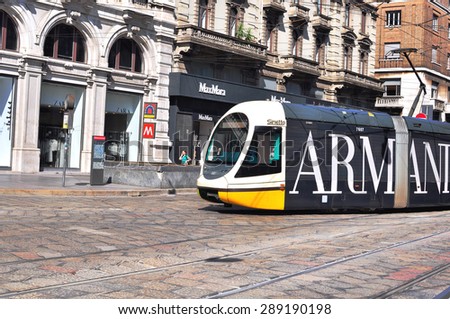 MILAN, ITALY - JUNE 20: Speed tram goes down the street in Milan downtown on June 20, 2015. Milan is the capital of Lombardy and one of the largest cities of Italy.