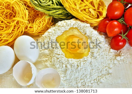 Ingredients for the preparation of homemade egg pasta.