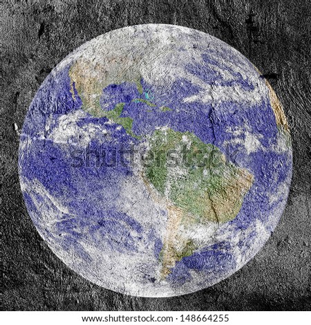 Earth drawn with chalk on the wall. Earth image courtesy by NASA