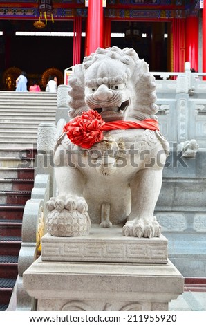 lion statues sculpture red lump wallpaper