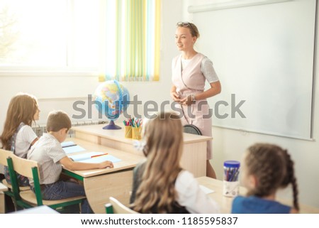 Female High School Teacher Taking Class in high school