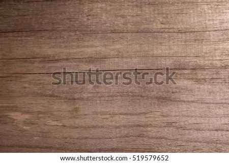 Brown wood texture with natural pattern. Chopping board or floor surface. Natural wood texture background.