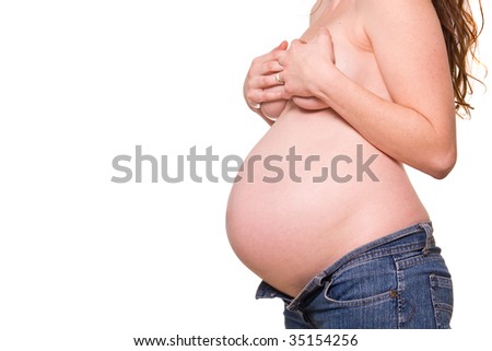 stock photo Image of pregnant woman touching her breasts with hands