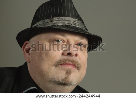 Obese Man in a hat