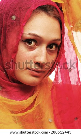 Pretty woman in a veil