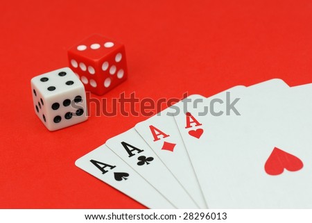 Dices and Playing Cards on Red
