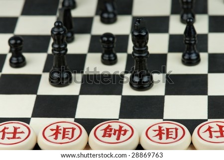 Western Chess Playing with Chinese Chess