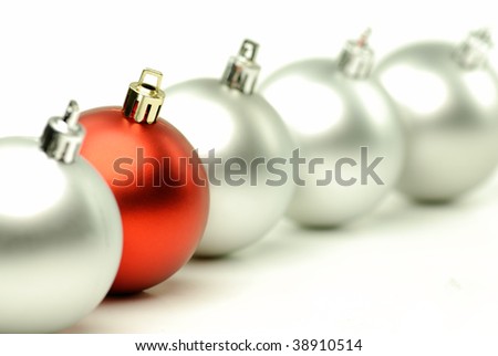 Row of red and silver christmas ball on white background,closeup.