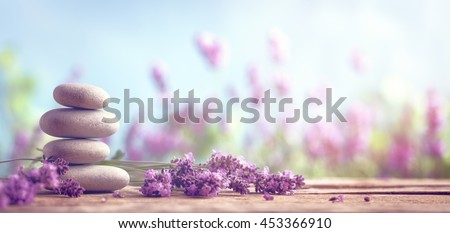 Spa still life with stack of stones and lavenders