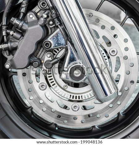 motorcycle disc brakes and wheel.