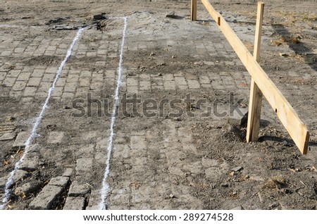 White markings on ground for digging construction foundation