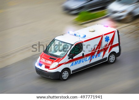 Ambulance van with flashing lights