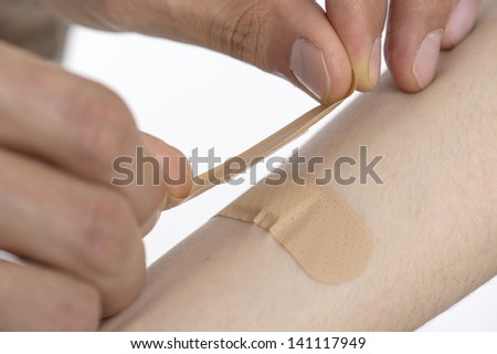 Treat wound with plaster