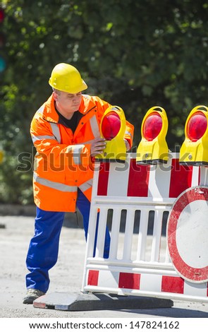 Workers checked the Construction Barrier