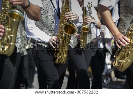 Saxophone player in a brass band
