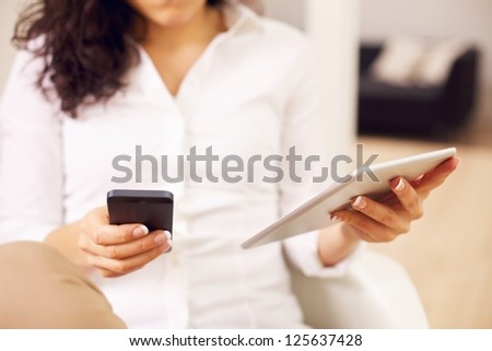 Modern woman connected with social media through technology